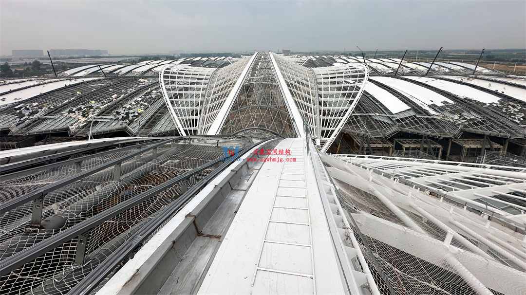 千帆競發(fā)勢如虹|中原國際會展中心膜結(jié)構(gòu)天幕攻堅(jiān)實(shí)錄,擎起中原會展新地標(biāo)! 千帆競發(fā)勢如虹|中原國際會展中心膜結(jié)構(gòu)天幕攻堅(jiān)實(shí)錄,擎起中原會展新地標(biāo)!