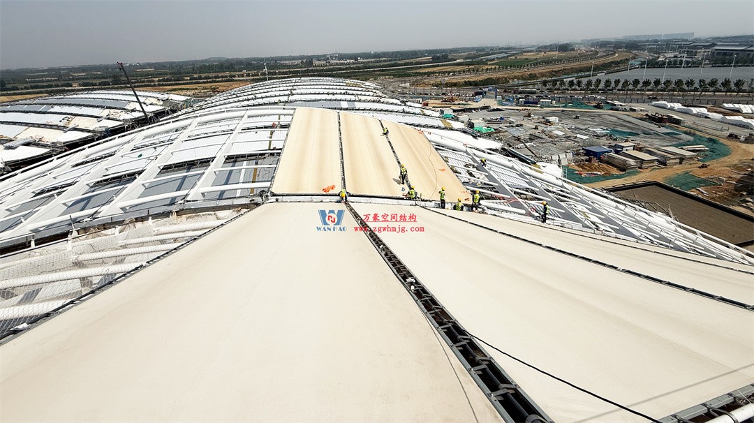 千帆競發(fā)勢如虹|中原國際會展中心膜結(jié)構(gòu)天幕攻堅(jiān)實(shí)錄,擎起中原會展新地標(biāo)! 千帆競發(fā)勢如虹|中原國際會展中心膜結(jié)構(gòu)天幕攻堅(jiān)實(shí)錄,擎起中原會展新地標(biāo)!